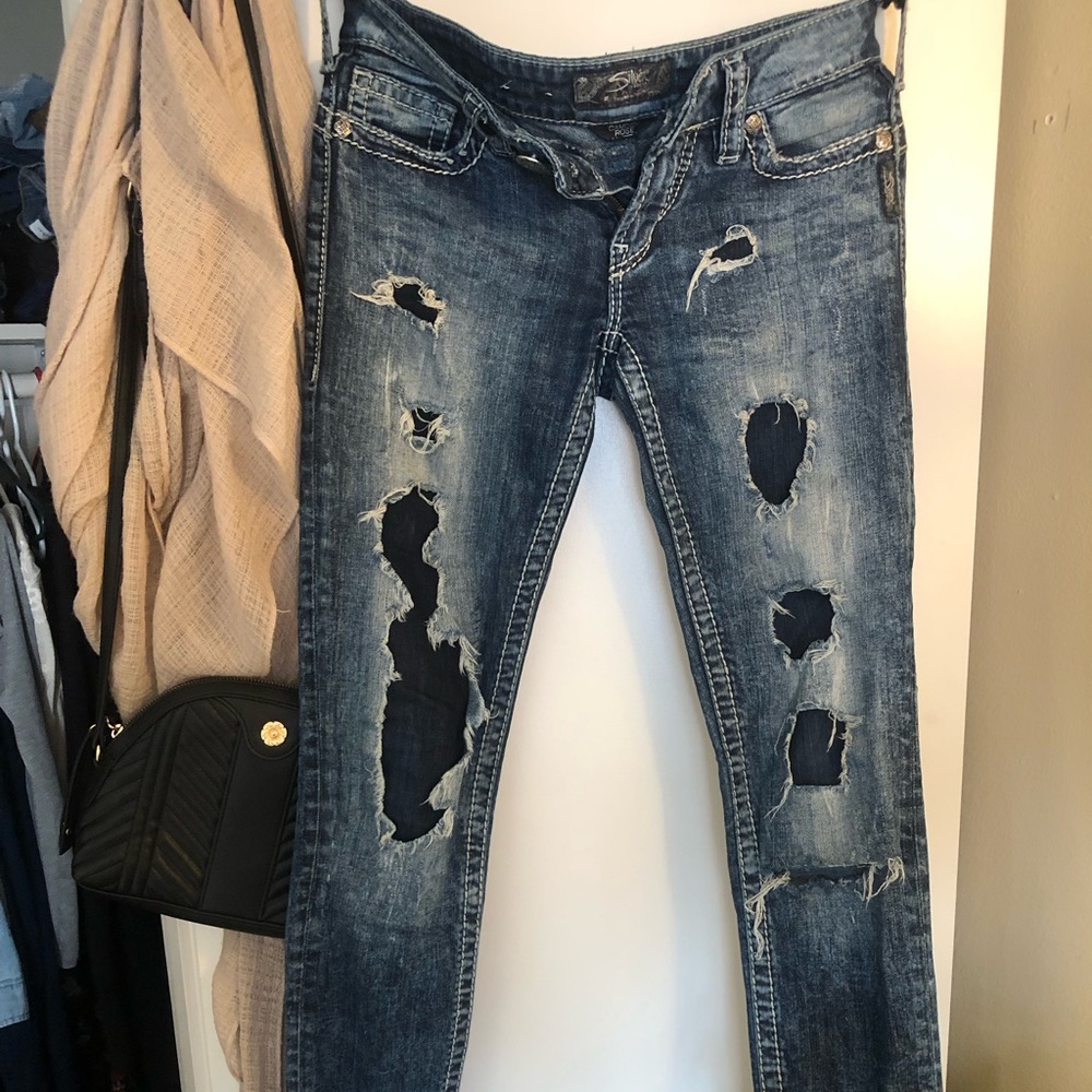 Distressed silver jeans. Size 26 length 33. Previously worn.